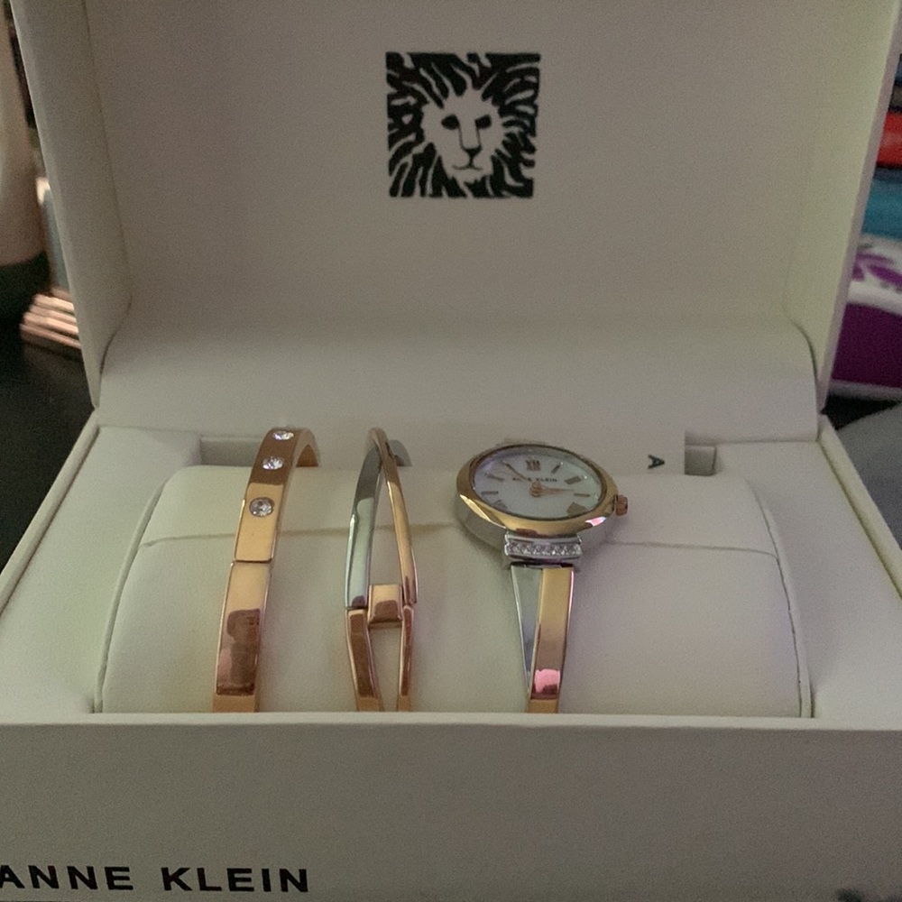 Anne Klein rose gold and silver with Swarovski crystals.